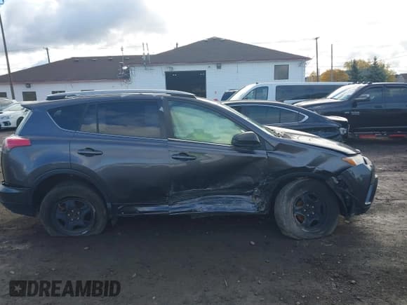 ✅ 2018 Toyota RAV4 LE • VIN: JTMBFREV8JJ729942 • Lot: 43557394. Listed on IAAI with 108,053 mi. Free auction sales archive from the USA and detailed vehicle history report at DreamBid. Image 13.