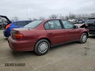 2003 Chevrolet Malibu with VIN 1G1ND52J13M696712, listed as a Copart auction lot 86052984 with 81,635 mi miles and Salvage title. Bid and sale history available at DreamBid. Image 3.
