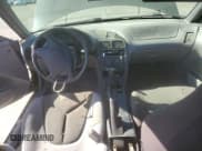 ✅ 1994 Ford Probe • VIN: 1ZVLT20A0R5113677 • Lot: 84206245. Listed on Copart with 130,266 mi. Free auction sales archive from the USA and detailed vehicle history report at DreamBid. Image 8.