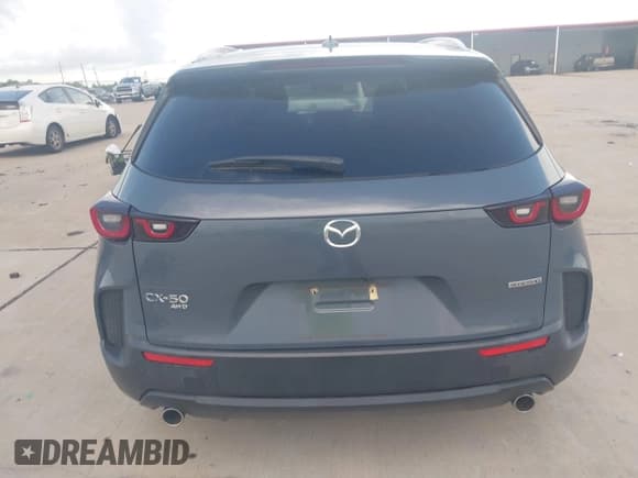 ✅ 2023 Mazda CX-50 S Premium Plus • VIN: 7MMVABEM0PN106956 • Лот: 43082881. Опубликован ранее на IAAI с пробегом 19 807 миль. Бесплатный доступ к архиву аукционных продаж из США и подробный отчёт об истории автомобиля на DreamBid. Изображение 16.