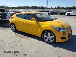 ✅ 2013 Hyundai Veloster w/Gray Int • VIN: KMHTC6AD6DU115771 • Lot: 77317364. Wystawiony na Copart z przebiegiem 124 294 mil. Bezpłatny archiwum sprzedaży aukcyjnych z USA i szczegółowy raport historii pojazdu na DreamBid. Zdjęcie 4.