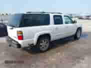 2005 Chevrolet Suburban LS z VIN 1GNFK16Z85J256010, wystawiony jako IAAI lot #42768572 z przebiegiem 260 000 mil mil oraz . Historia ofert i sprzedaży dostępna na DreamBid. Obrazek 4.