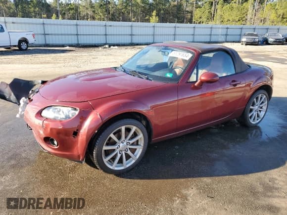✅ 2006 Mazda MX-5 Miata Grand Touring • VIN: JM1NC25F660122876 • Lot: 81297654. Wystawiony na Copart z przebiegiem 120 397 mil. Bezpłatny archiwum sprzedaży aukcyjnych z USA i szczegółowy raport historii pojazdu na DreamBid. Zdjęcie 1.