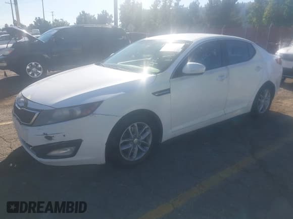 ✅ 2013 Kia Optima LX • VIN: KNAGM4A74D5403586 • Lot: 43658195. Listed on IAAI with 222,104 mi. Free auction sales archive from the USA and detailed vehicle history report at DreamBid. Image 2.