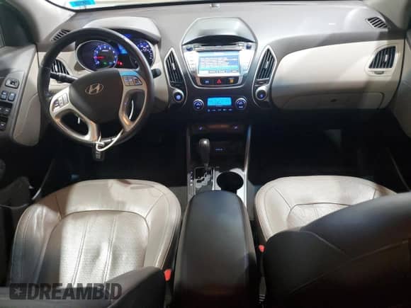 2013 Hyundai Tucson GLS z VIN KM8JUCAC9DU774387, wystawiony jako Copart lot #67417185 z przebiegiem 108 385 mil mil oraz Szkoda całkowita • Salvage title. Historia ofert i sprzedaży dostępna na DreamBid. Obrazek 8.