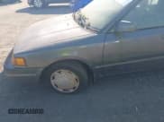 ✅ 1992 Mazda Protege • VIN: JM1BG2262N0508852 • Lot: 43184811. Listed on IAAI with 152,900 mi. Free auction sales archive from the USA and detailed vehicle history report at DreamBid. Image 6.