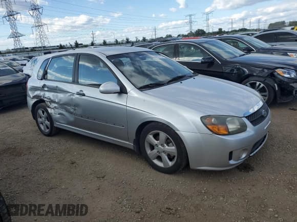 ✅ 2009 Kia Spectra Spectra5 • VIN: KNAFE241195023469 • Lot: 84055165. Listed on Copart with 142,357 mi. Free auction sales archive from the USA and detailed vehicle history report at DreamBid. Image 4.