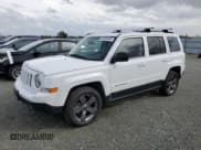 ✅ 2014 Jeep Patriot Latitude • VIN: 1C4NJPFA5ED804886 • Lot: 84983455. Listed on Copart with 92,148 mi. Free auction sales archive from the USA and detailed vehicle history report at DreamBid. Image 1.