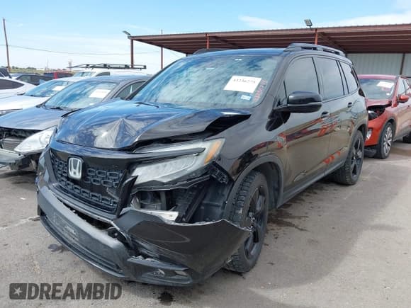 ✅ 2020 Honda Passport Elite • VIN: 5FNYF8H00LB003152 • Lot: 43236775. Listed on IAAI with 63,303 mi. Free auction sales archive from the USA and detailed vehicle history report at DreamBid. Image 2.