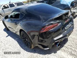 ✅ 2023 Toyota Supra 3.0 • VIN: WZ1DB0G02PW059934 • Лот: 61283444. Опубликован ранее на Copart с пробегом 12 027 миль. Бесплатный доступ к архиву аукционных продаж из США и подробный отчёт об истории автомобиля на DreamBid. Изображение 2.