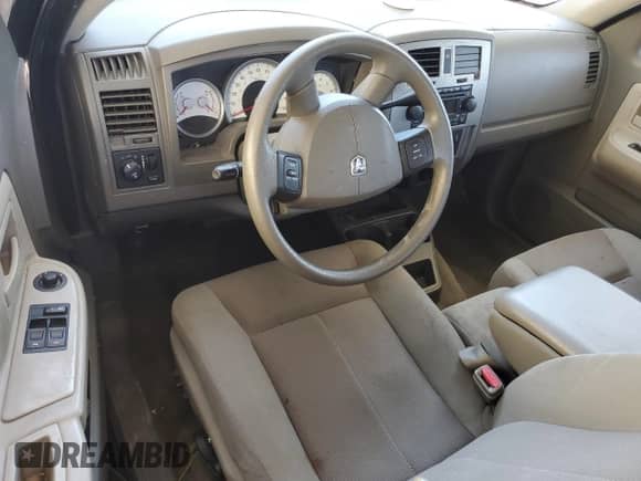 2006 Dodge Dakota SLT z VIN 1D7HE42N36S523634, wystawiony jako Copart lot #62717474 z przebiegiem 72 295 mil mil oraz Szkoda całkowita • Salvage title. Historia ofert i sprzedaży dostępna na DreamBid. Obrazek 8.