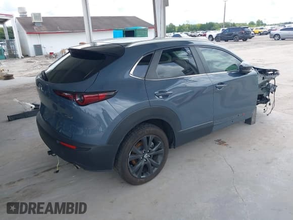 ✅ 2022 Mazda CX-30 S Preferred • VIN: 3MVDMBCL0NM423011 • Lot: 43151473. Listed on IAAI with 30,741 mi. Free auction sales archive from the USA and detailed vehicle history report at DreamBid. Image 4.