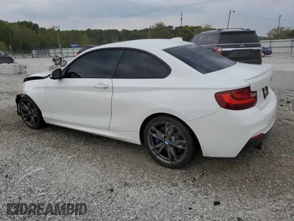 ✅ 2016 BMW 2 Series M235i • VIN: WBA1J7C55GV289744 • Лот: 80252805. Опубликован ранее на Copart с пробегом 82 983 миль. Бесплатный доступ к архиву аукционных продаж из США и подробный отчёт об истории автомобиля на DreamBid. Изображение 2.