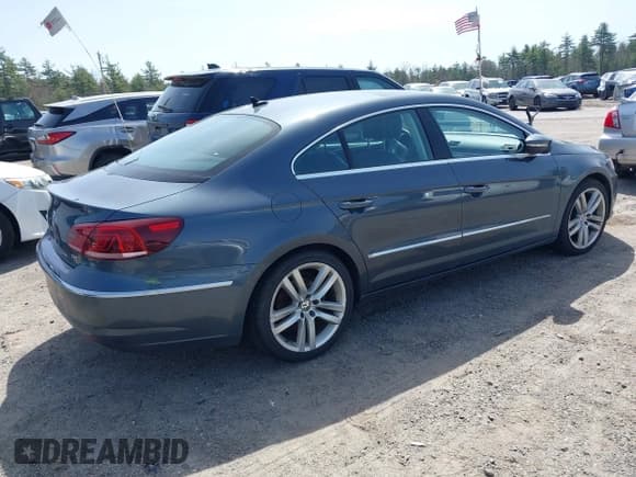 ✅ 2014 Volkswagen CC Executive • VIN: WVWRP7AN7EE501483 • Lot: 42090985. Listed on IAAI with 121,737 mi. Free auction sales archive from the USA and detailed vehicle history report at DreamBid. Image 4.