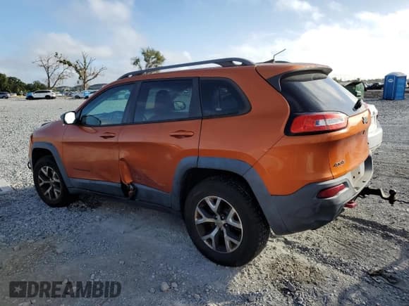 ✅ 2016 Jeep Cherokee Trailhawk • VIN: 1C4PJMBS9GW132909 • Lot: 84931095. Listed on Copart with 170,794 mi. Free auction sales archive from the USA and detailed vehicle history report at DreamBid. Image 2.