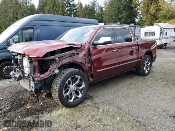 2020 Ram 1500 Limited with VIN 1C6SRFHM5LN258926, listed as a Copart auction lot 87432605 with 69,397 mi miles and Salvage title. Bid and sale history available at DreamBid. Image 1.