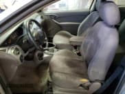 ✅ 2004 Ford Focus ZX3 • VIN: 3FAFP31304R117850 • Lot: 51764525. Listed on Copart with 181,817 mi. Free auction sales archive from the USA and detailed vehicle history report at DreamBid. Image 7.