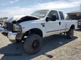 ✅ 1999 Ford F-250 XL • VIN: 1FTNX21F4XEA88550 • Lot: 59798655. Listed on Copart with 310,287 mi. Free auction sales archive from the USA and detailed vehicle history report at DreamBid. Image 1.