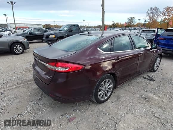 ✅ 2017 Ford Fusion Hybrid SE • VIN: 3FA6P0LU8HR244887 • Лот: 43586983. Опубликован ранее на IAAI с пробегом 140 571 миль. Бесплатный доступ к архиву аукционных продаж из США и подробный отчёт об истории автомобиля на DreamBid. Изображение 4.