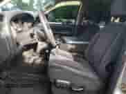 2005 Dodge 1500 SLT z VIN 1D7HU18N85S303218, wystawiony jako Copart lot #68878684 z przebiegiem 244 007 mil mil oraz Szkoda całkowita • Salvage title. Historia ofert i sprzedaży dostępna na DreamBid. Obrazek 7.