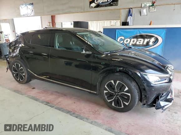 ✅ 2022 Kia EV6 Wind • VIN: KNDC3DLCXN5061447 • Лот: 65962644. Опубликован ранее на Copart с пробегом 33 395 миль. Бесплатный доступ к архиву аукционных продаж из США и подробный отчёт об истории автомобиля на DreamBid. Изображение 4.