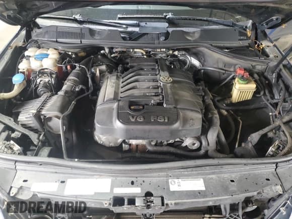 ✅ 2012 Volkswagen Touareg Lux • VIN: WVGEF9BP4CD006475 • Lot: 64091175. Listed on Copart with 179,996 mi. Free auction sales archive from the USA and detailed vehicle history report at DreamBid. Image 12.