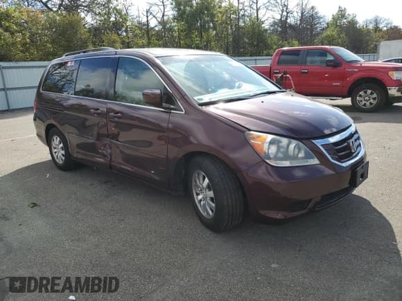✅ 2010 Honda Odyssey EX-L • VIN: 5FNRL3H77AB060572 • Lot: 82253525. Listed on Copart with 95,772 mi. Free auction sales archive from the USA and detailed vehicle history report at DreamBid. Image 4.