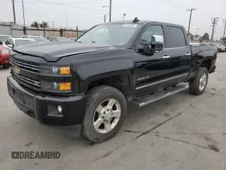 2016 Chevrolet Silverado 2500HD LTZ с VIN 1GC1KWE83GF199150, выставлен на аукционе Copart как лот 60152305 с пробегом 148 704 миль миль и Списание • Salvage title. История ставок и продаж доступна на DreamBid. Изображение 1.
