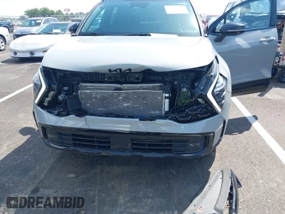 ✅ 2025 Kia Sportage X-Pro • VIN: 5XYK7CDF9SG257059 • Lot: 42513343. Listed on IAAI with 14,721 mi. Free auction sales archive from the USA and detailed vehicle history report at DreamBid. Image 6.