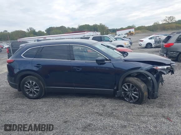 ✅ 2021 Mazda CX-9 Touring • VIN: JM3TCBCYXM0521709 • Lot: 43452547. Listed on IAAI with 50,115 mi. Free auction sales archive from the USA and detailed vehicle history report at DreamBid. Image 13.