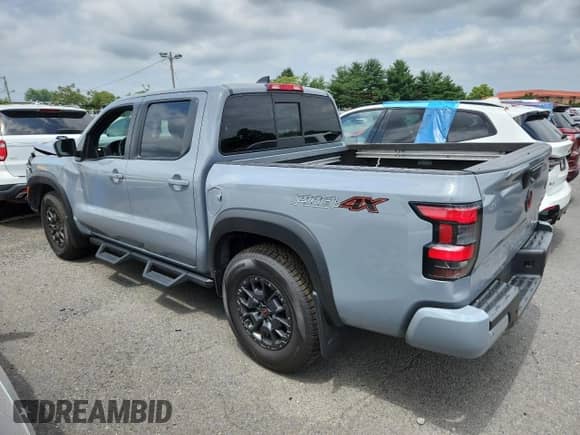 2022 Nissan Frontier Pro-4X z VIN 1N6ED1EK6NN644569, wystawiony jako Copart lot #63808555 z przebiegiem 105 267 mil mil oraz Szkoda całkowita • Salvage title. Historia ofert i sprzedaży dostępna na DreamBid. Obrazek 2.