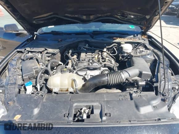 2021 Ford Mustang EcoBoost z VIN 1FA6P8TH8M5134422, wystawiony jako IAAI lot #43414779 z przebiegiem 70 611 mil mil oraz . Historia ofert i sprzedaży dostępna na DreamBid. Obrazek 10.