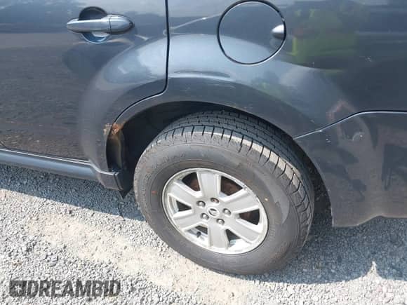 2010 Mercury Mariner z VIN 4M2CN8B79AKJ28843, wystawiony jako IAAI lot #40099437 z przebiegiem 203 467 mil mil oraz . Historia ofert i sprzedaży dostępna na DreamBid. Obrazek 16.