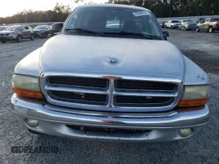 ✅ 2003 Dodge Dakota • VIN: 1D7GG16X33S130101 • Lot: 85999314. Wystawiony na Copart z przebiegiem 221 292 mil. Bezpłatny archiwum sprzedaży aukcyjnych z USA i szczegółowy raport historii pojazdu na DreamBid. Zdjęcie 5.