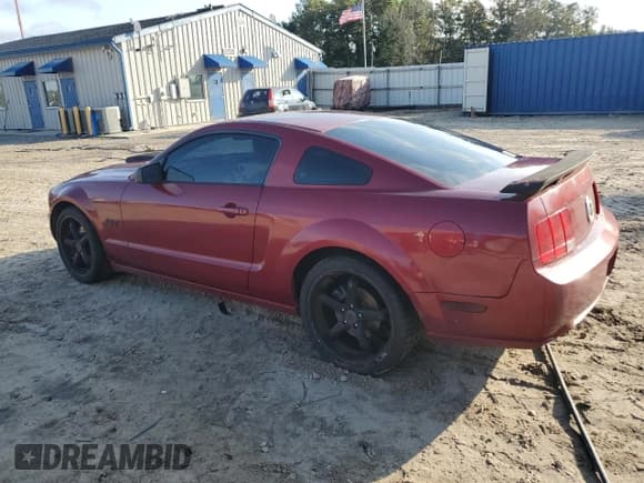 ✅ 2005 Ford Mustang GT Deluxe • VIN: 1ZVFT82H355120109 • Lot: 90318005. Listed on Copart with 174,839 mi. Free auction sales archive from the USA and detailed vehicle history report at DreamBid. Image 2.