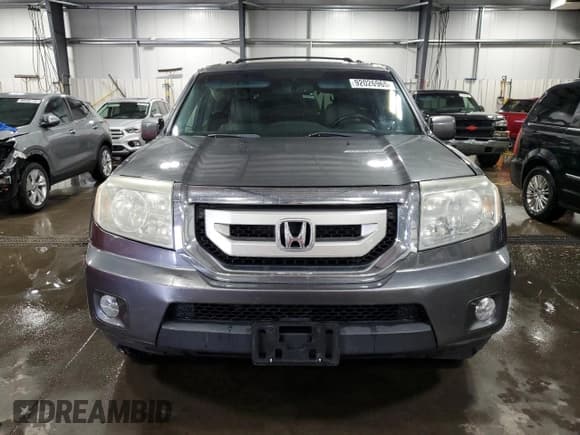 ✅ 2011 Honda Pilot EX-L • VIN: 5FNYF4H75BB051704 • Лот: 92026965. Опубликован ранее на Copart с пробегом 124 117 миль. Бесплатный доступ к архиву аукционных продаж из США и подробный отчёт об истории автомобиля на DreamBid. Изображение 5.