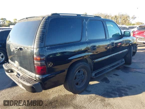 2005 Chevrolet Tahoe LS with VIN 1GNEC13V85J176815, listed as a IAAI auction lot 43567136 with 152,649 mi miles and . Bid and sale history available at DreamBid. Image 4.