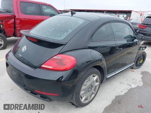 ✅ 2016 Volkswagen Beetle SE • VIN: 3VWJ17AT5GM636971 • Lot: 41616939. Listed on IAAI with 116,021 mi. Free auction sales archive from the USA and detailed vehicle history report at DreamBid. Image 4.