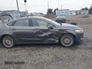 ✅ 2016 Ford Fusion Titanium • VIN: 3FA6P0K91GR248968 • Лот: 43181413. Опубликован ранее на IAAI с пробегом 126 692 миль. Бесплатный доступ к архиву аукционных продаж из США и подробный отчёт об истории автомобиля на DreamBid. Изображение 6.