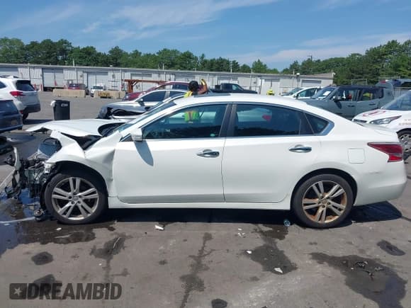 ✅ 2013 Nissan Altima SL • VIN: 1N4BL3AP7DN423184 • Lot: 42586715. Wystawiony na IAAI z przebiegiem 145 175 mil. Bezpłatny archiwum sprzedaży aukcyjnych z USA i szczegółowy raport historii pojazdu na DreamBid. Zdjęcie 14.
