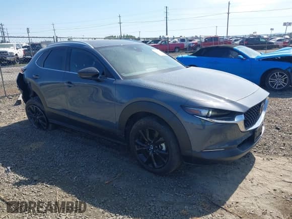 ✅ 2022 Mazda CX-30 S Carbon Edition • VIN: 3MVDMBCL8NM422737 • Lot: 42229336. Listed on IAAI with 14,665 mi. Free auction sales archive from the USA and detailed vehicle history report at DreamBid. Image 1.