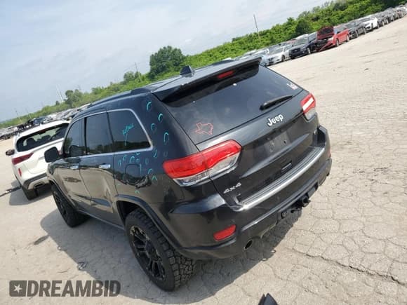 ✅ 2014 Jeep Grand Cherokee Overland • VIN: 1C4RJFCG6EC547604 • Lot: 55824944. Listed on Copart with 128,330 mi. Free auction sales archive from the USA and detailed vehicle history report at DreamBid. Image 2.
