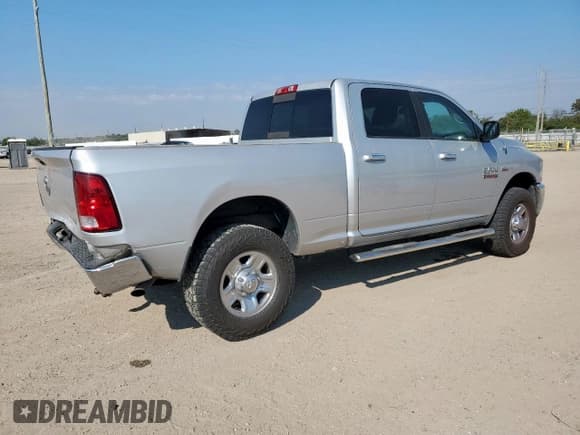 ✅ 2014 Ram 2500 SLT • VIN: 3C6TR5DT1EG207401 • Lot: 84538805. Listed on Copart with 170,943 mi. Free auction sales archive from the USA and detailed vehicle history report at DreamBid. Image 3.