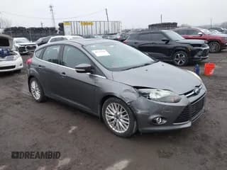 ✅ 2014 Ford Focus Titanium • VIN: 1FADP3N29EL422630 • Lot: 43743369. Wystawiony na IAAI z przebiegiem 96 753 mil. Bezpłatny archiwum sprzedaży aukcyjnych z USA i szczegółowy raport historii pojazdu na DreamBid. Zdjęcie 1.