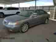 2009 Hyundai Azera GLS z VIN KMHFC46D29A360151, wystawiony jako Copart lot #47944885 z przebiegiem 103 850 mil mil oraz Czysty tytuł • Clean title. Historia ofert i sprzedaży dostępna na DreamBid. Obrazek 1.