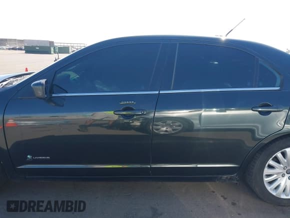 ✅ 2010 Ford Fusion Hybrid • VIN: 3FADP0L32AR270891 • Lot: 43210675. Wystawiony na IAAI z przebiegiem 277 208 mil. Bezpłatny archiwum sprzedaży aukcyjnych z USA i szczegółowy raport historii pojazdu na DreamBid. Zdjęcie 14.