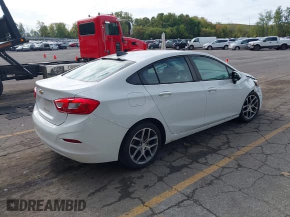 ✅ 2017 Chevrolet Cruze LS • VIN: 1G1BC5SM5H7162599 • Lot: 43400934. Listed on IAAI with 122,035 mi. Free auction sales archive from the USA and detailed vehicle history report at DreamBid. Image 4.