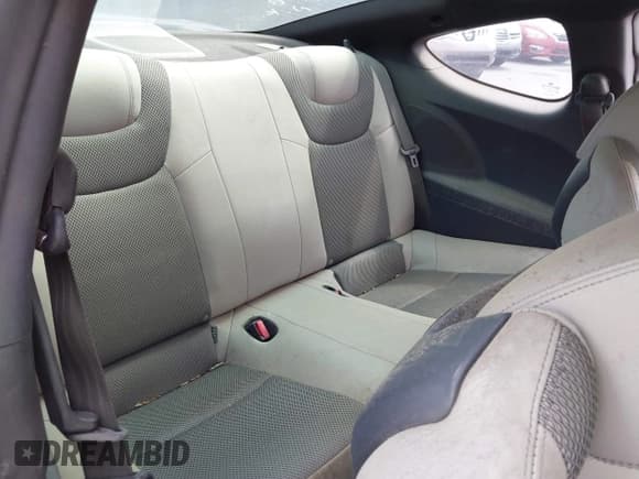 ✅ 2013 Hyundai Genesis Coupe Premium • VIN: KMHHT6KD8DU087203 • Lot: 42018152. Wystawiony na IAAI z przebiegiem 104 354 mil. Bezpłatny archiwum sprzedaży aukcyjnych z USA i szczegółowy raport historii pojazdu na DreamBid. Zdjęcie 8.