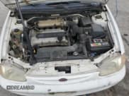 ✅ 2001 Kia Sephia • VIN: KNAFB121615073133 • Lot: 59884435. Wystawiony na Copart z przebiegiem 177 649 mil. Bezpłatny archiwum sprzedaży aukcyjnych z USA i szczegółowy raport historii pojazdu na DreamBid. Zdjęcie 11.