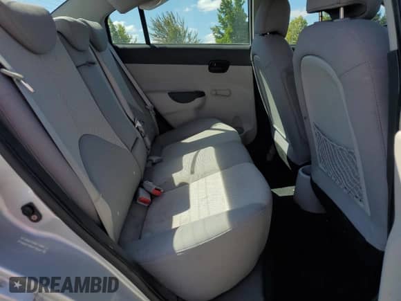 2009 Hyundai Accent Auto GLS z VIN KMHCN46C39U315786, wystawiony jako Copart lot #67562734 z przebiegiem 143 444 mil mil oraz Szkoda całkowita • Salvage title. Historia ofert i sprzedaży dostępna na DreamBid. Obrazek 10.